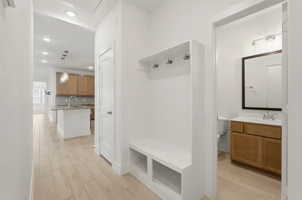 a view of a kitchen cabinets and wooden floor