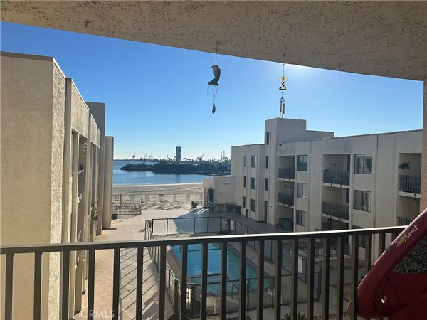 a view of a balcony with city view