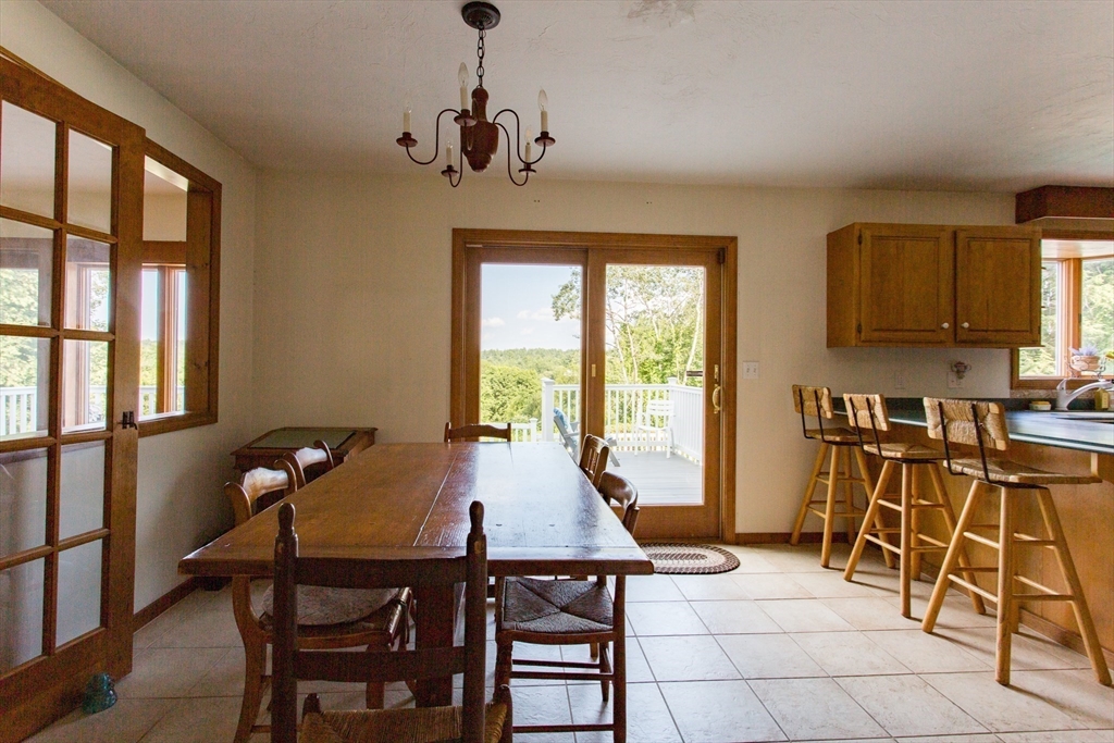 9 Birch Hill Road West Brookfield, MA 01585 - Photo 12 of 38 a view of a dining room with furniture window and outside view