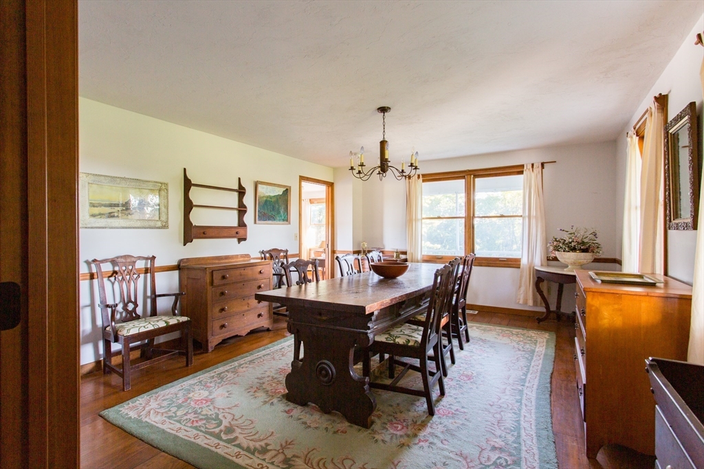 9 Birch Hill Road West Brookfield, MA 01585 - Photo 16 of 38 a view of a dining room with furniture window and wooden floor
