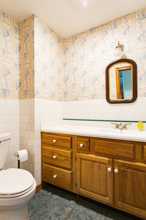 9 Birch Hill Road West Brookfield, MA 01585 - Photo 20 of 38 a bathroom with a toilet sink and mirror