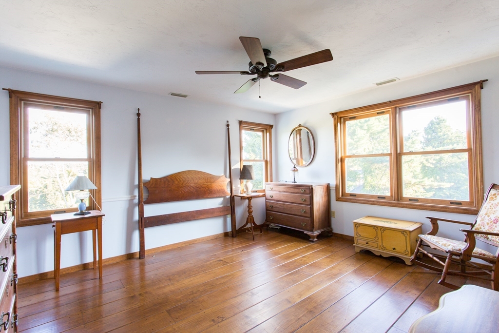 9 Birch Hill Road West Brookfield, MA 01585 - Photo 22 of 38 a bedroom with furniture and a large window