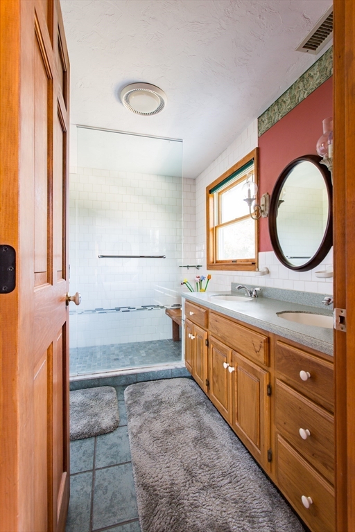 9 Birch Hill Road West Brookfield, MA 01585 - Photo 24 of 38 a bathroom with a granite countertop sink toilet mirror and a bathtub