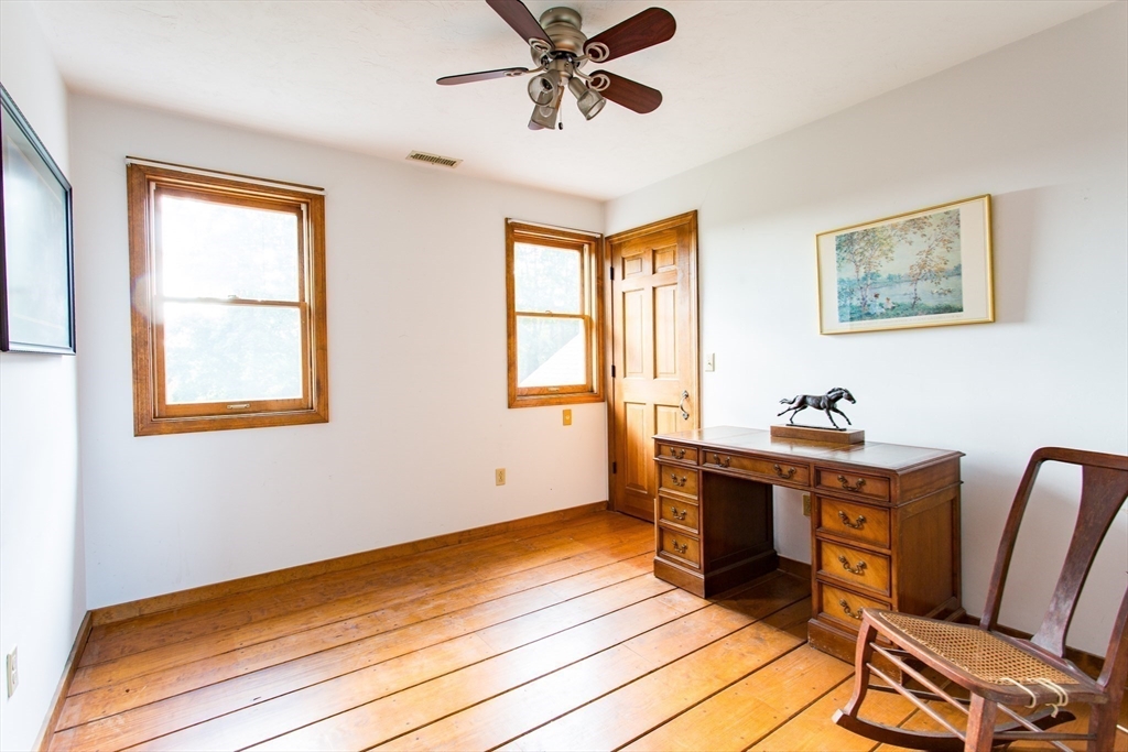 9 Birch Hill Road West Brookfield, MA 01585 - Photo 29 of 38 a workspace with wooden floor and windows