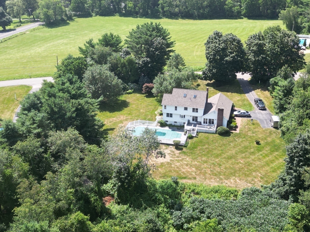 9 Birch Hill Road West Brookfield, MA 01585 - Photo 36 of 38 an aerial view of a house with garden space and swimming pool