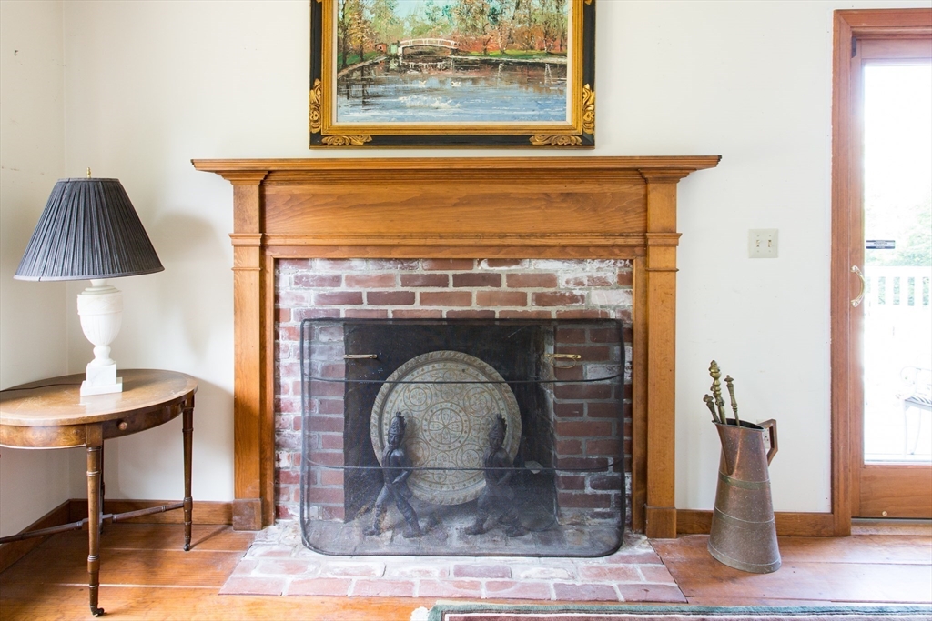 9 Birch Hill Road West Brookfield, MA 01585 - Photo 6 of 38 a closeup of a fireplace