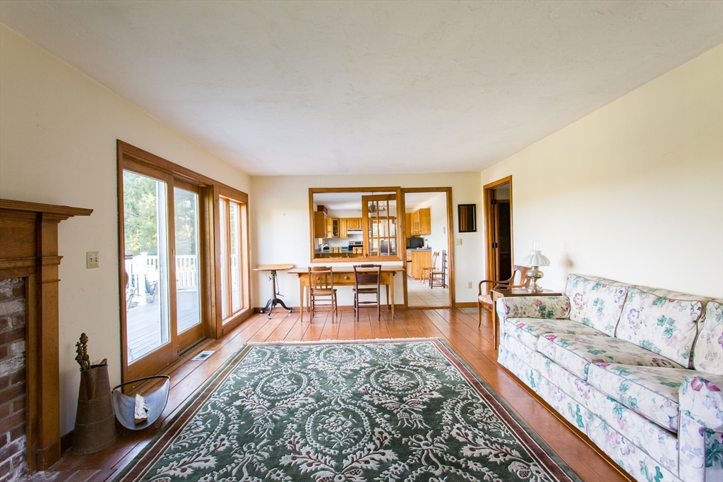 9 Birch Hill Road West Brookfield, MA 01585 - Photo 7 of 38 a living room with furniture and a table