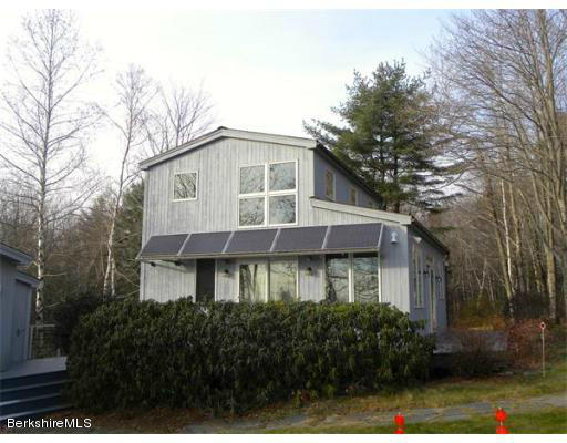 264 A Patten Road Shelburne Falls, MA 01370 - Photo 2 of 25 a front view of a house with a garden