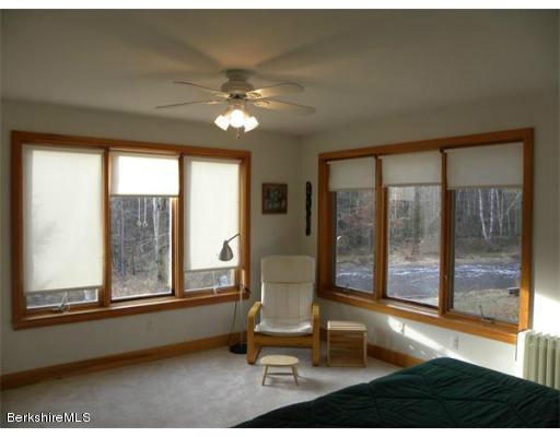264 A Patten Road Shelburne Falls, MA 01370 - Photo 15 of 25 a room with gym equipment and a large window