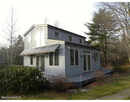 264 A Patten Road Shelburne Falls, MA 01370 - Photo 20 of 25 a front view of a house with a garden