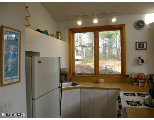 264 A Patten Road Shelburne Falls, MA 01370 - Photo 10 of 25 a kitchen with stainless steel appliances granite countertop a refrigerator and a sink