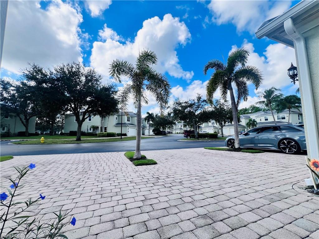 1435 Mariposa Circle, Unit 102 Naples, FL 34105 - Photo 21 of 24 a view of a park