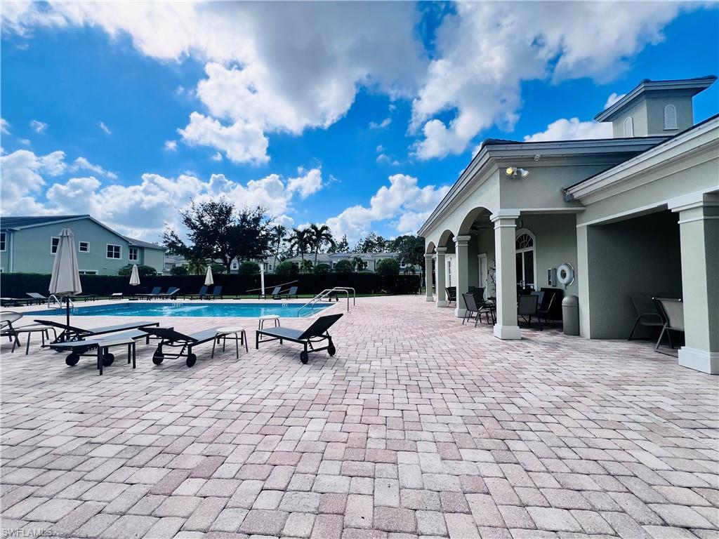 1435 Mariposa Circle, Unit 102 Naples, FL 34105 - Photo 24 of 24 a view of a outdoor space with a patio