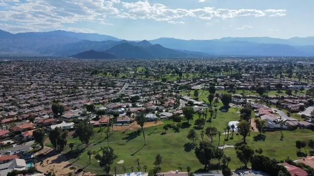 a view of a city with mountain
