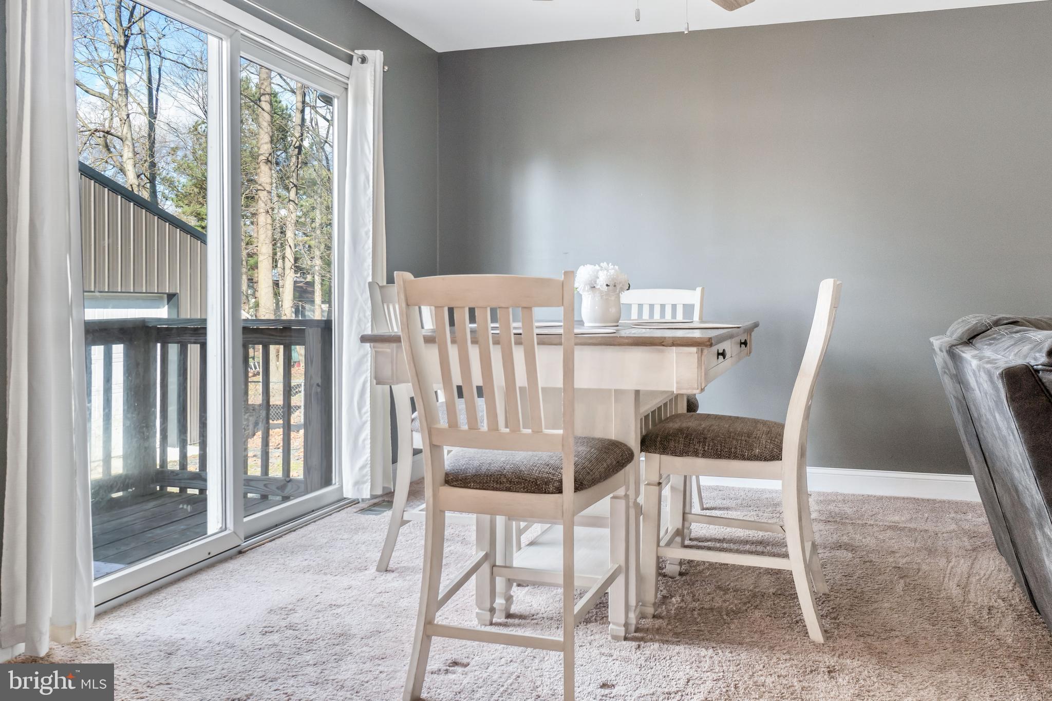 11 N Road Chesapeake City, MD 21915 - Photo 11 of 22 Dining area with sliders to back deck