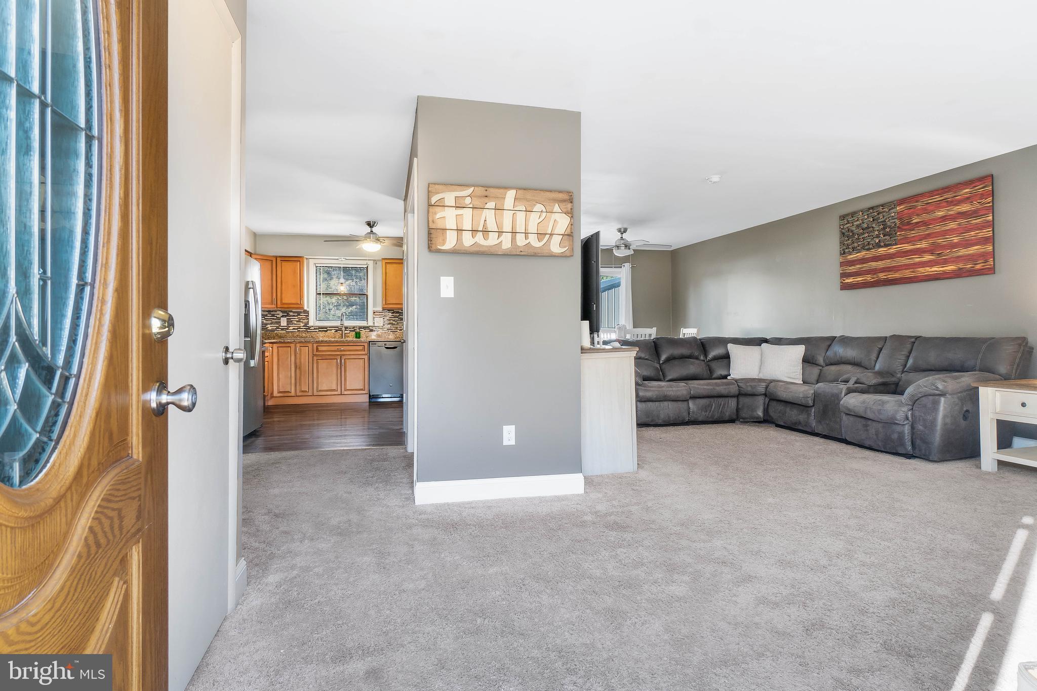 Welcoming foyer into family room