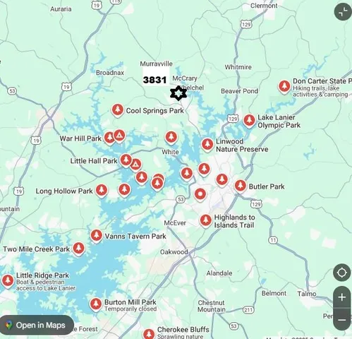 a view of a brick building with potted plants