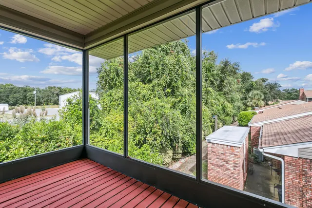 a view of a balcony with an outdoor space