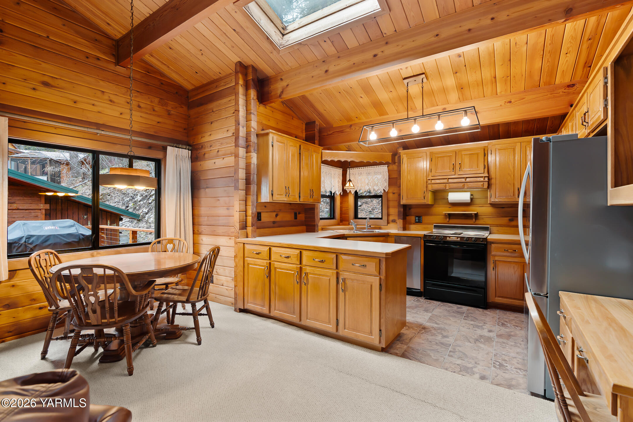 120 Eagles Ridge Lane Naches, WA 98937 - Photo 13 of 31 a large kitchen with a table and chairs