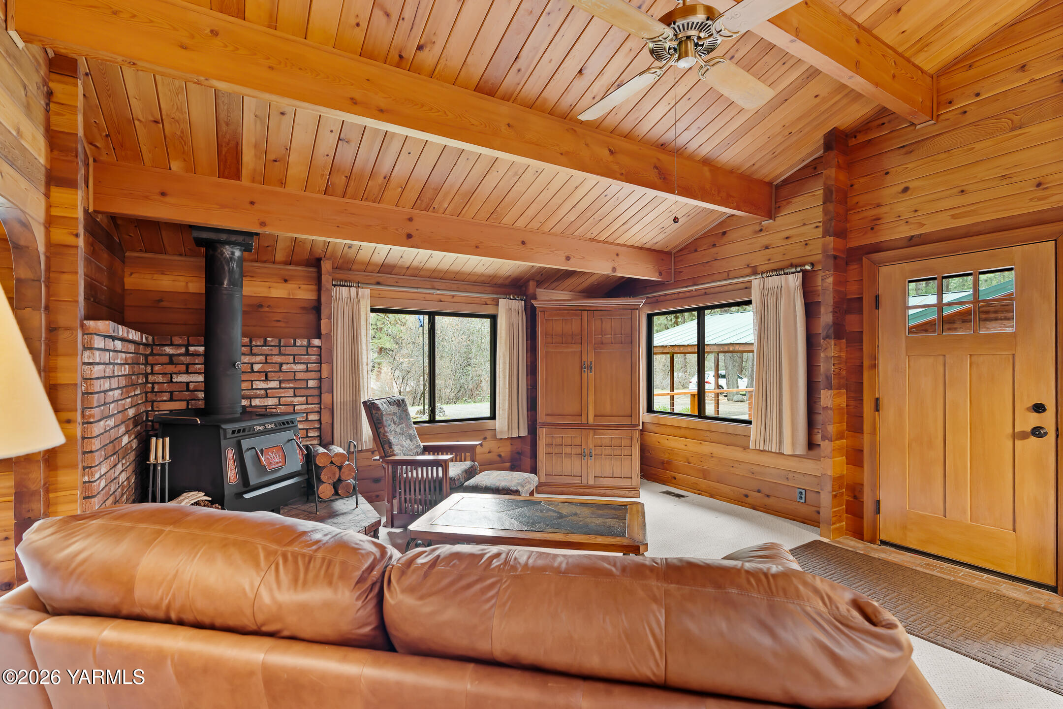 120 Eagles Ridge Lane Naches, WA 98937 - Photo 16 of 31 a living room with furniture and a large window