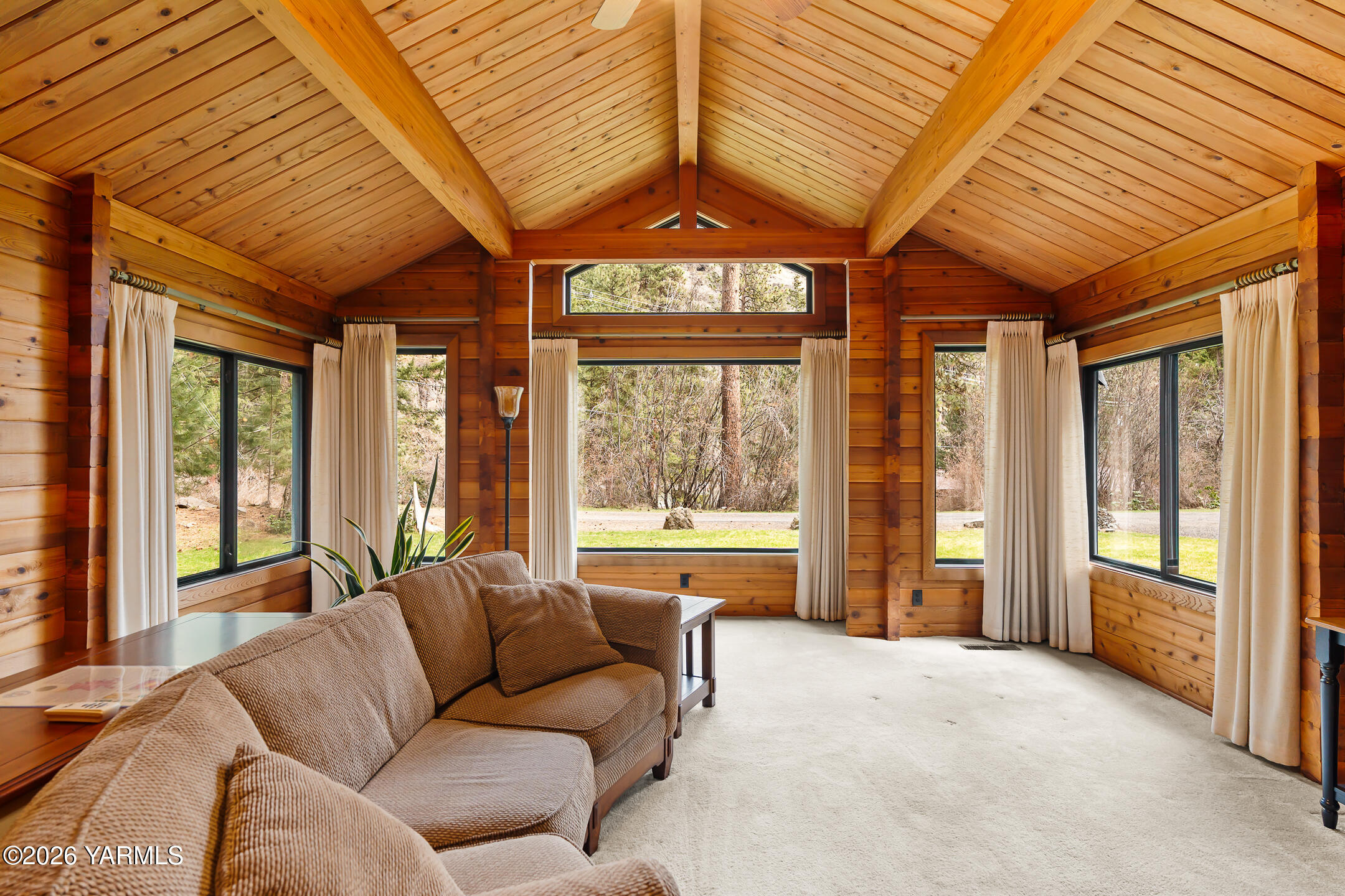120 Eagles Ridge Lane Naches, WA 98937 - Photo 20 of 31 a living room with furniture and large windows
