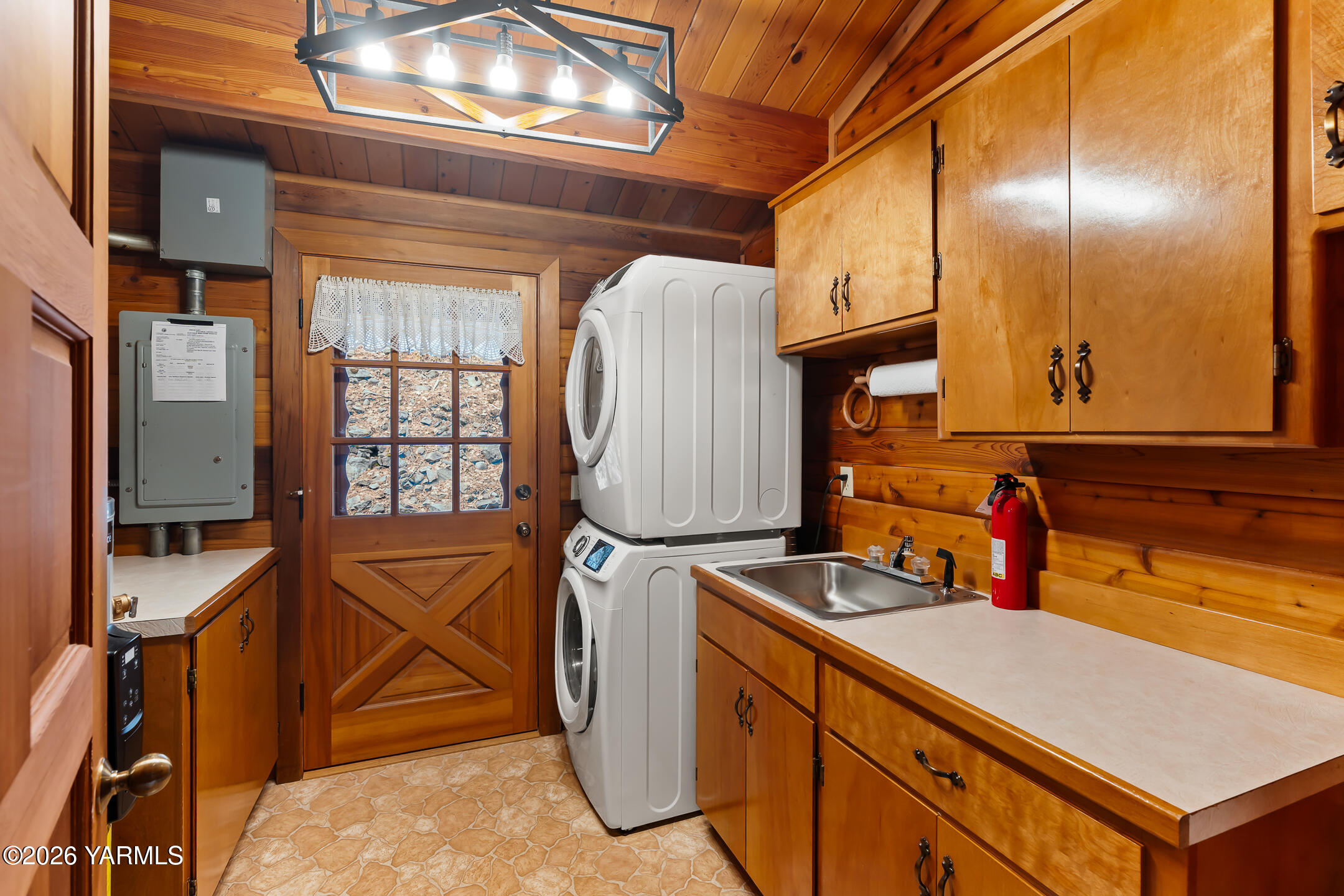 120 Eagles Ridge Lane Naches, WA 98937 - Photo 21 of 31 a kitchen with stainless steel appliances granite countertop a sink and a refrigerator