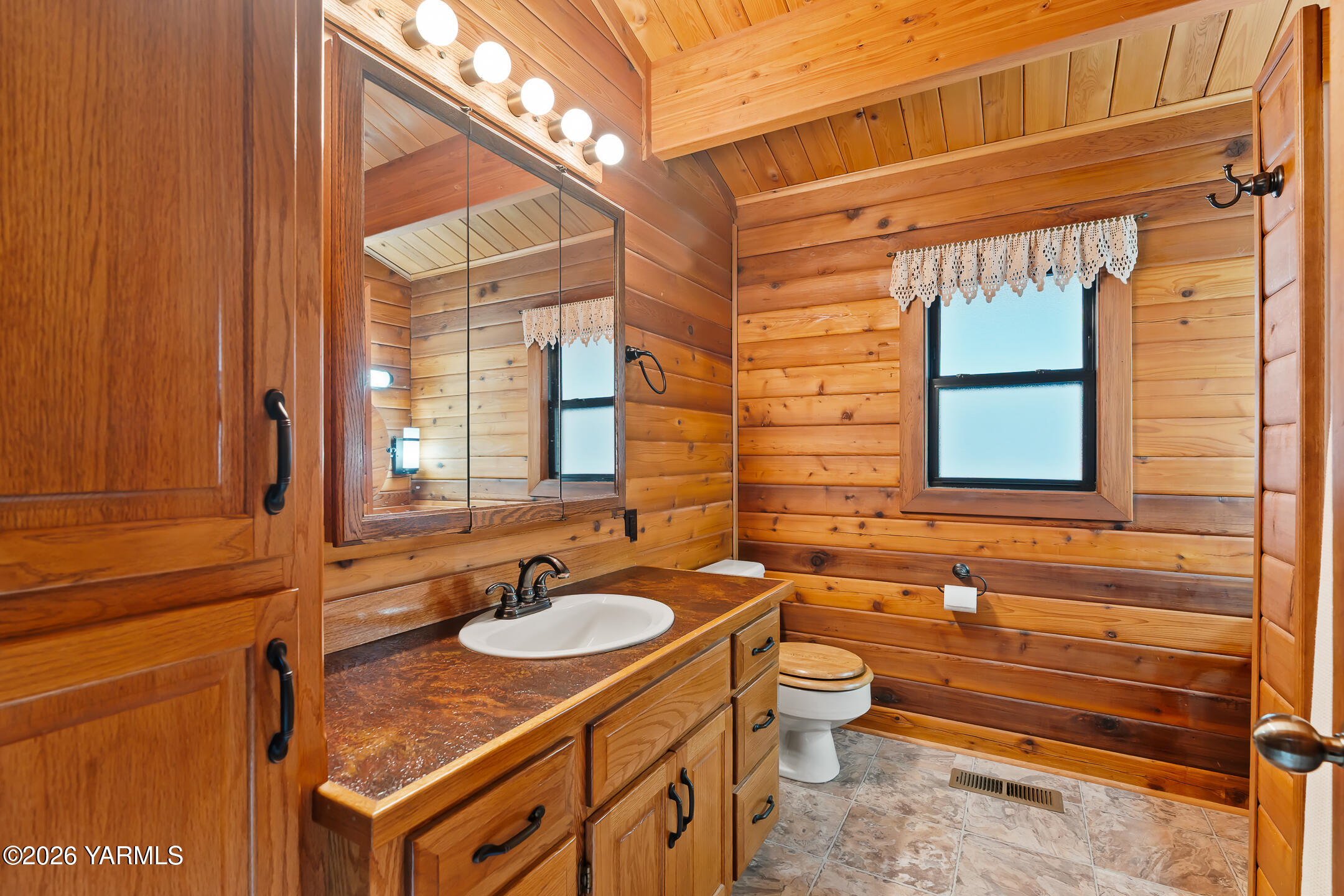 120 Eagles Ridge Lane Naches, WA 98937 - Photo 22 of 31 a bathroom with a granite countertop sink and a mirror