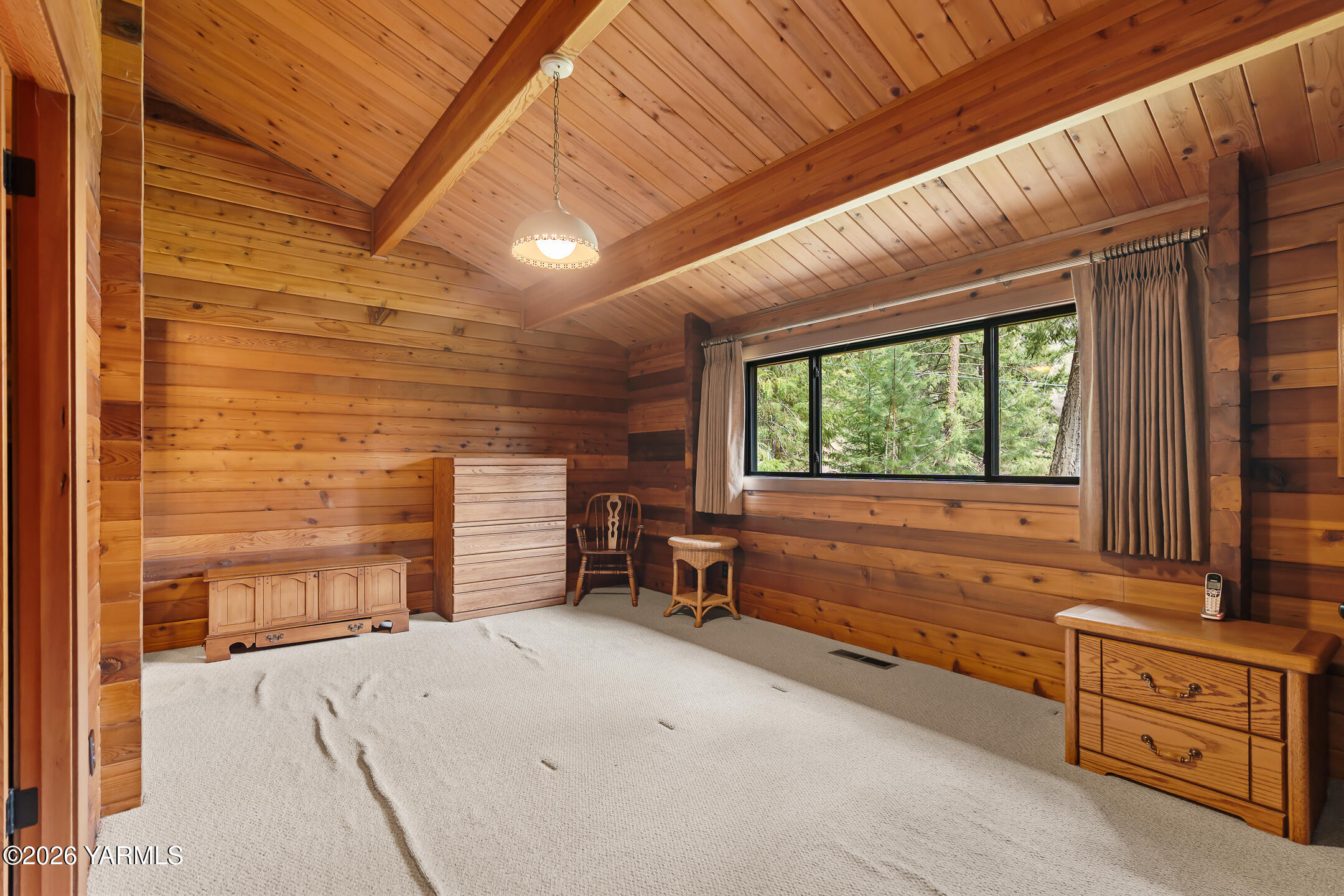 120 Eagles Ridge Lane Naches, WA 98937 - Photo 25 of 31 a room with furniture and a window