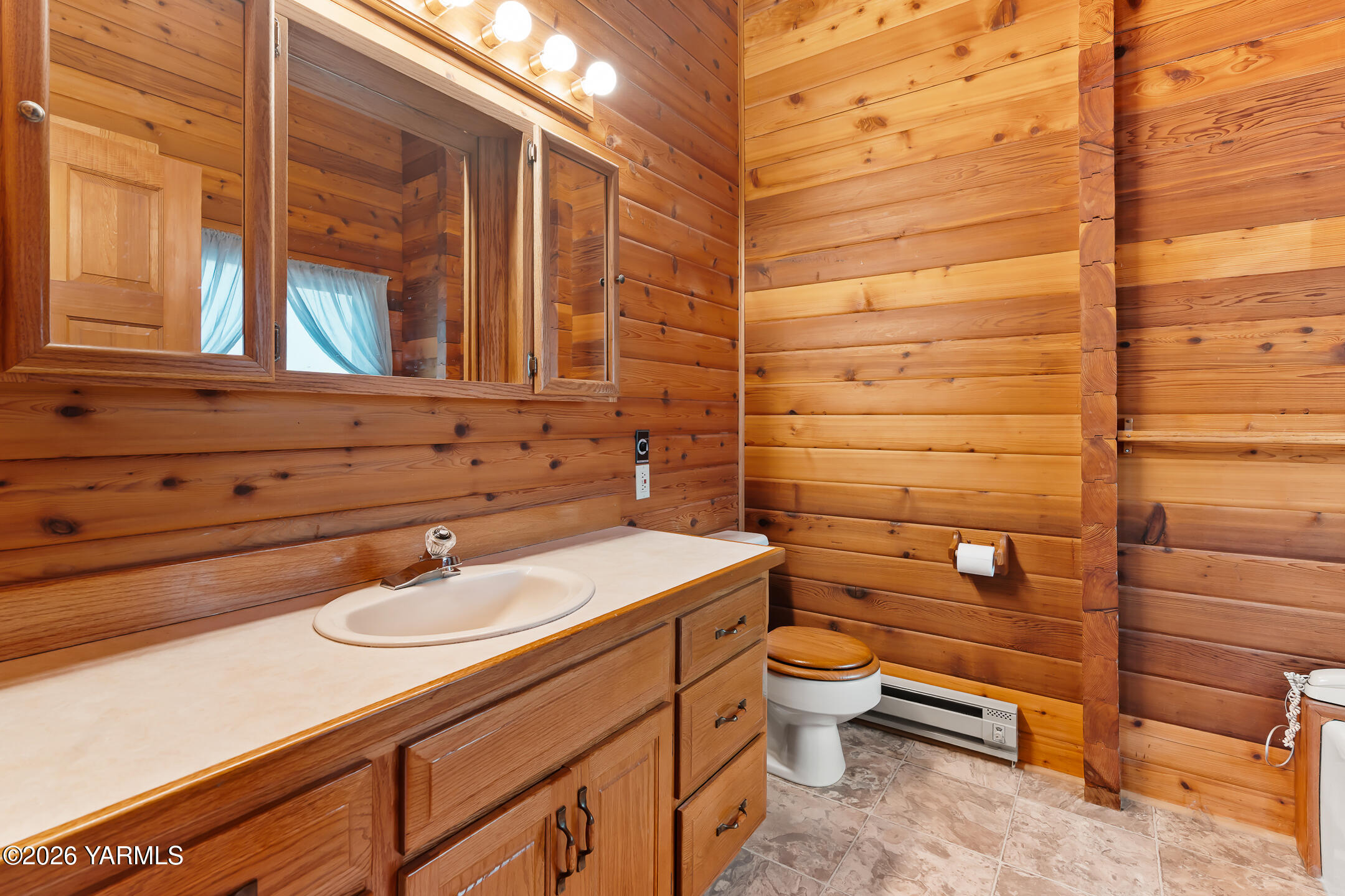 120 Eagles Ridge Lane Naches, WA 98937 - Photo 27 of 31 a bathroom with a sink a toilet and a mirror