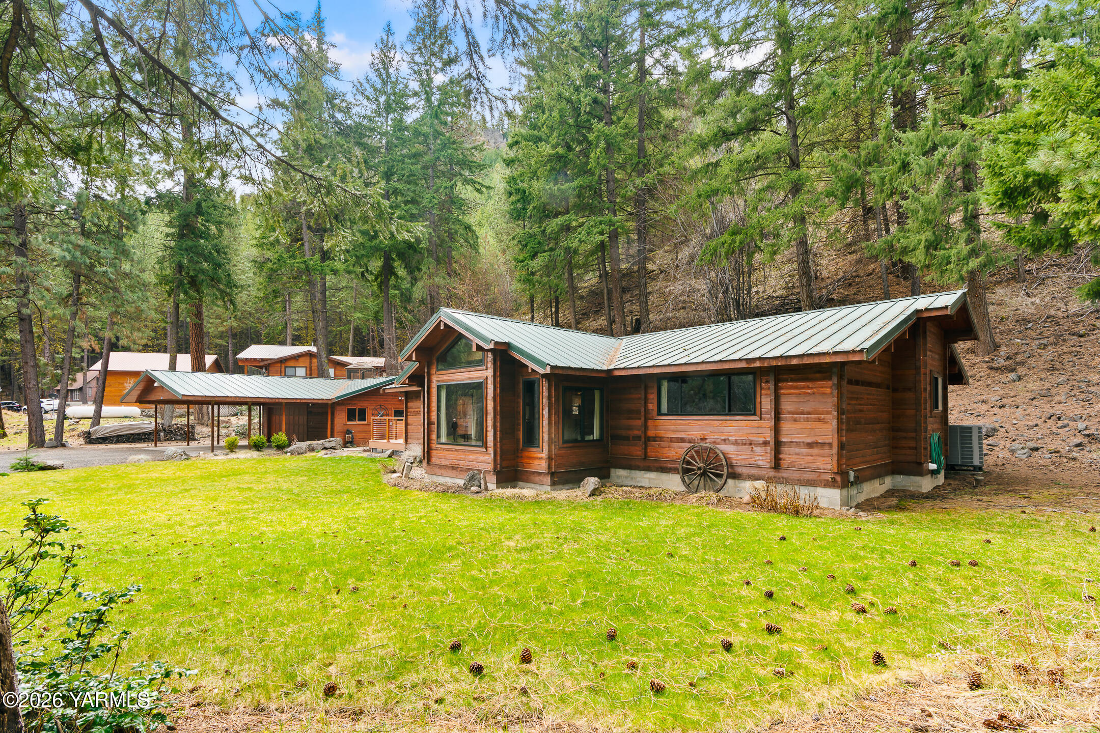 120 Eagles Ridge Lane Naches, WA 98937 - Photo 6 of 31 a front view of a house with garden