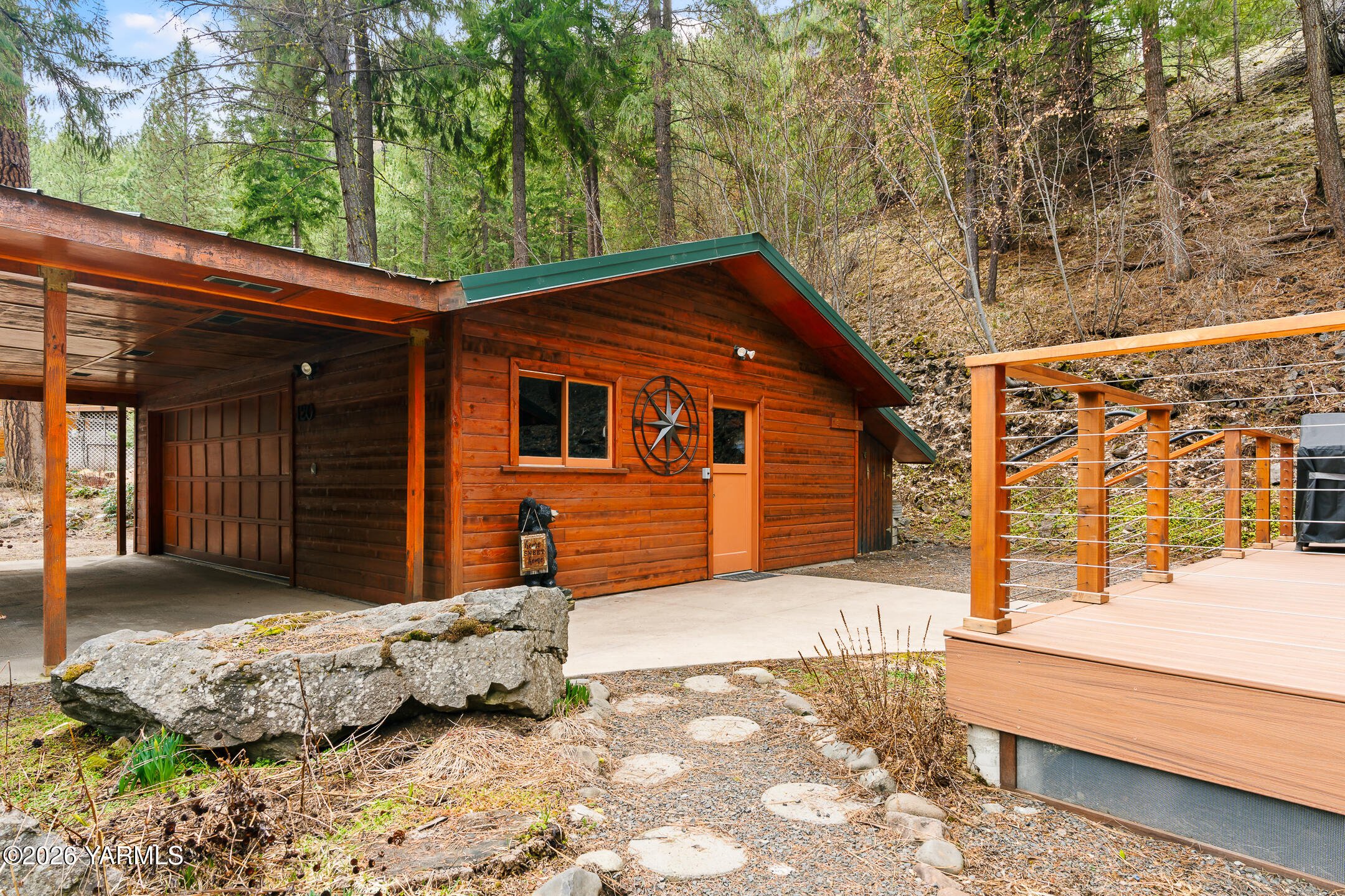120 Eagles Ridge Lane Naches, WA 98937 - Photo 7 of 31 a front view of a house with a yard