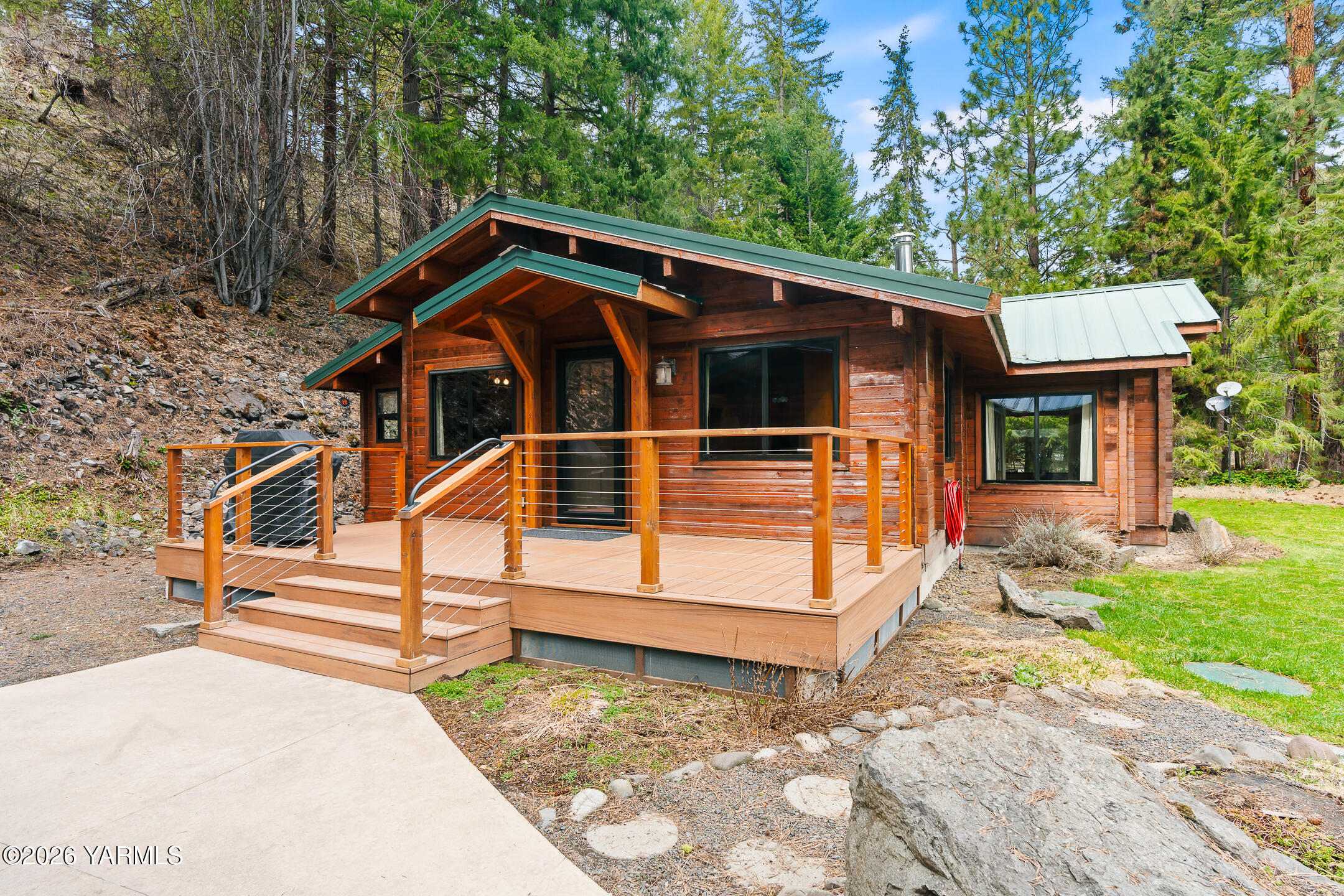 120 Eagles Ridge Lane Naches, WA 98937 - Photo 8 of 31 a view of a house with a yard