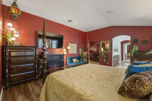 a bathroom with a bathtub and a sink