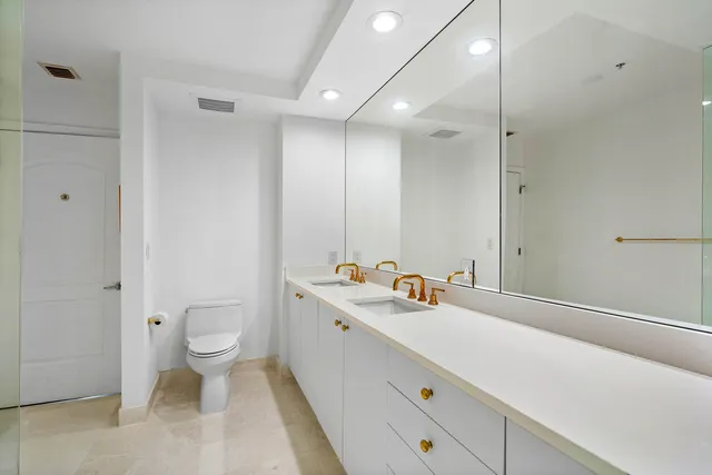 a view of bathroom with a sink toilet and shower