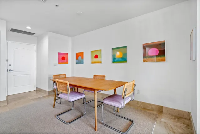 a view of a workspace with furniture