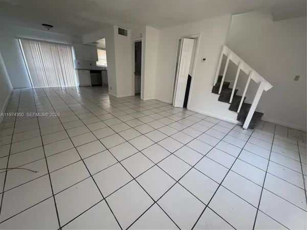 an empty room with windows