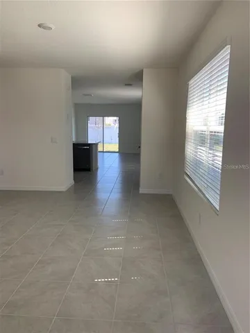a view of a livingroom with a window