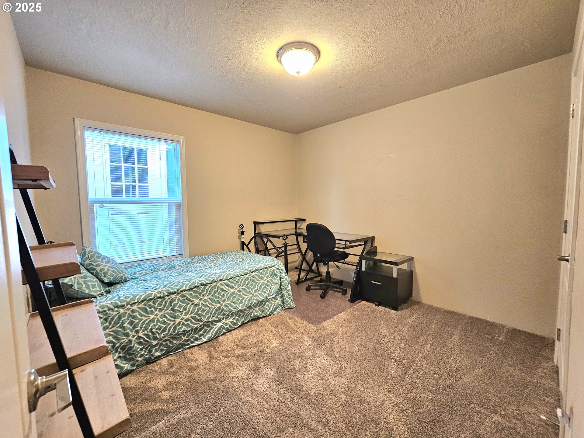 4675 Union Terrace Springfield, OR 97478 - Photo 31 of 37 a bedroom with furniture and a window