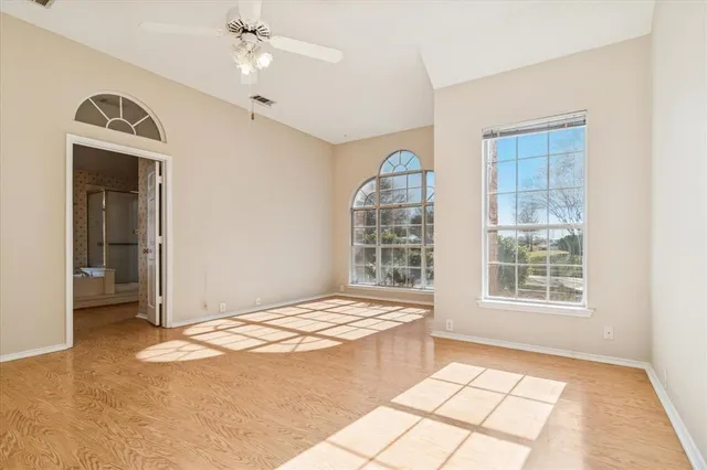 a view of an empty room and window