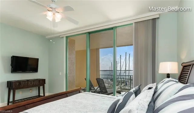 a bathroom with a double vanity sink mirror and toilet