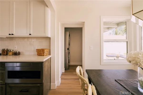 a view of dining room and wooden floor