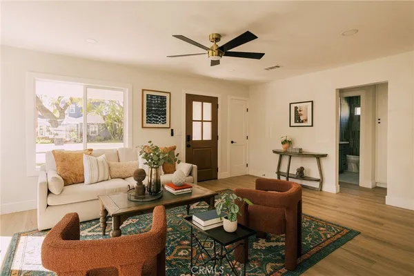 a living room with furniture and a window