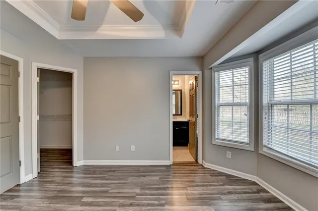 a bathroom with a toilet and a bathtub