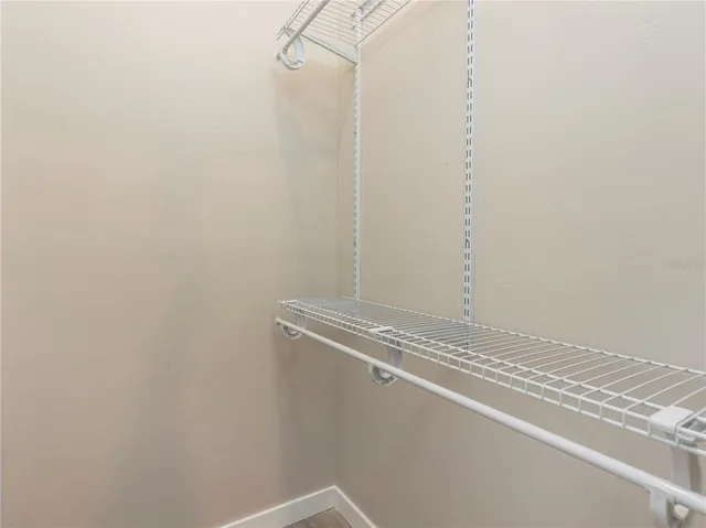 a view of a room with racks on the wall