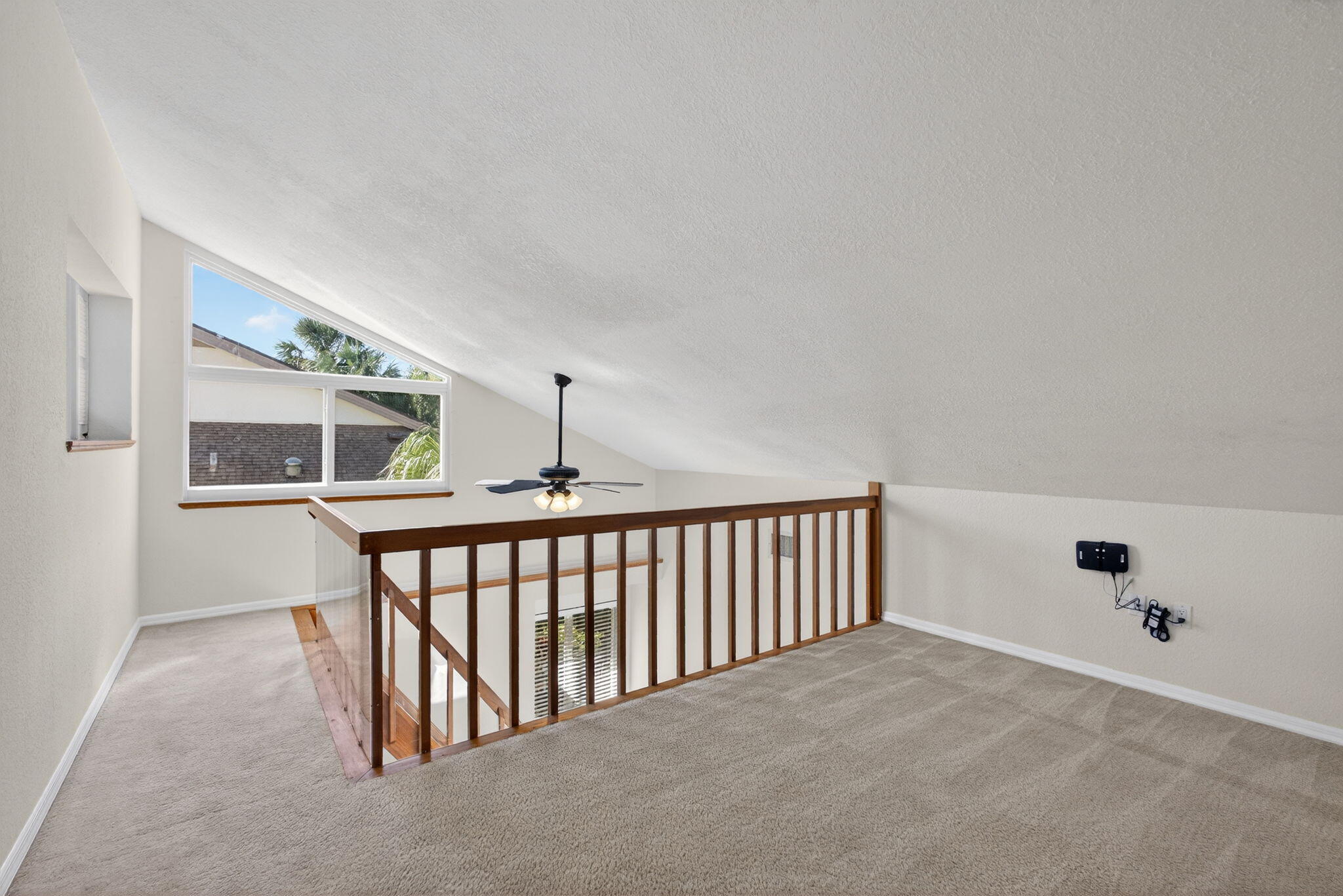 141 Cape Pointe Circle Jupiter, FL 33477 - Photo 21 of 31 a view of an empty room with a window