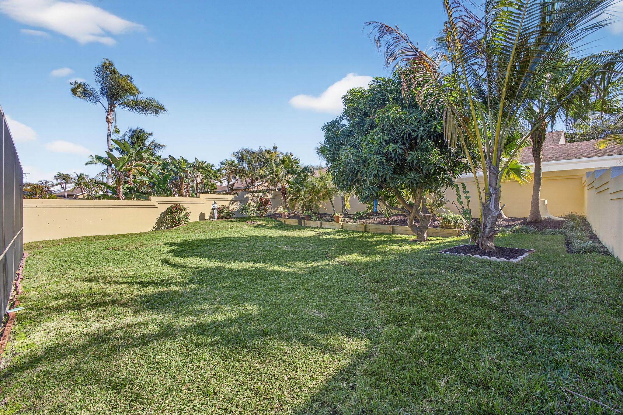 141 Cape Pointe Circle Jupiter, FL 33477 - Photo 29 of 31 a view of a garden