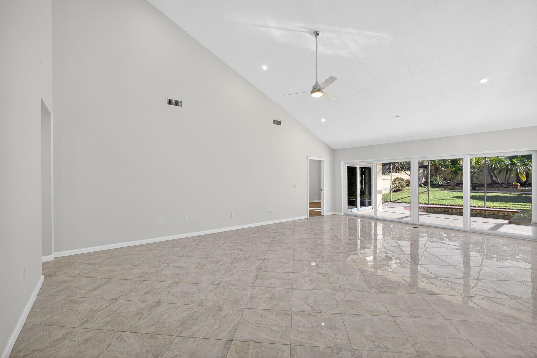 141 Cape Pointe Circle Jupiter, FL 33477 - Photo 9 of 31 a view of an empty room with a window