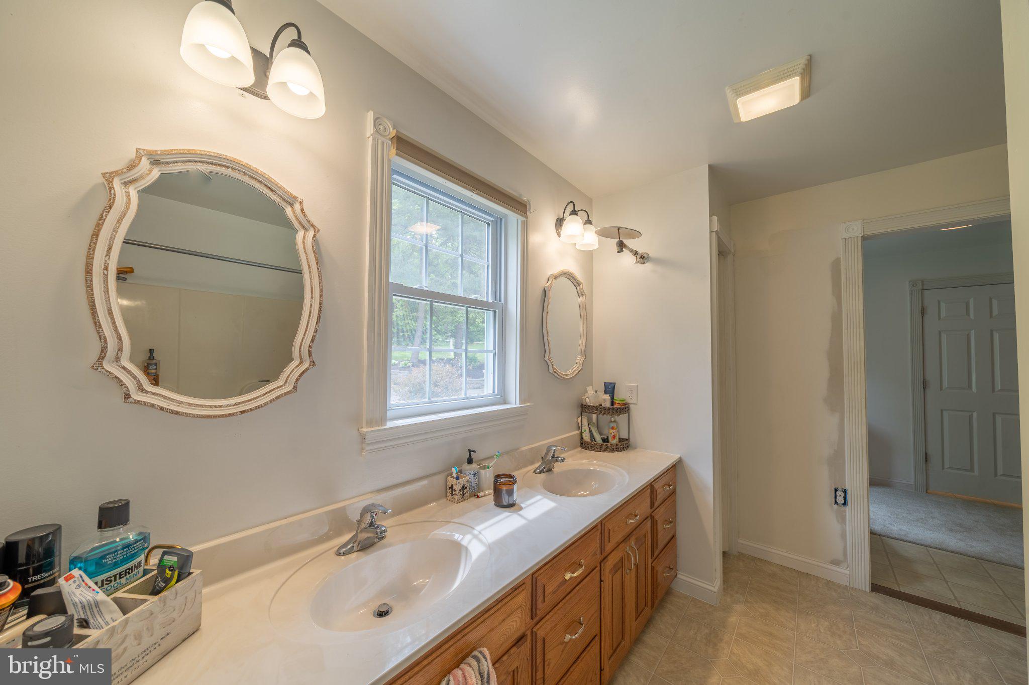 2201 Blain Road Loysville, PA 17047 - Photo 33 of 89 Bright and airy dual-sink bathroom.