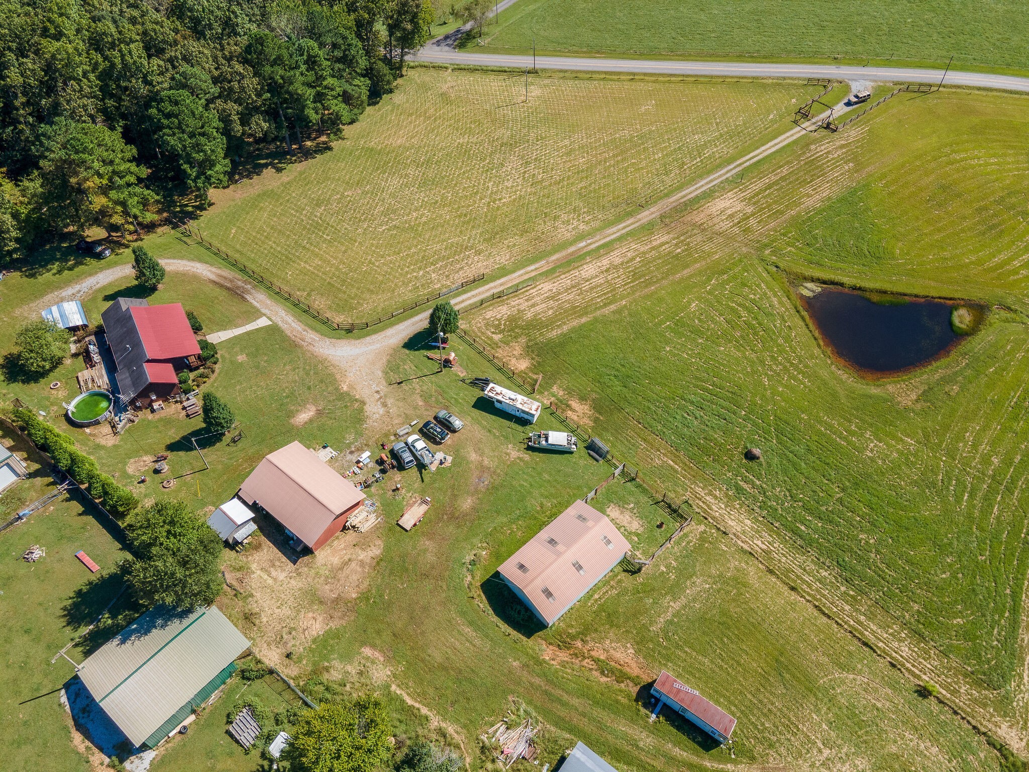580 Eno Road Dickson, TN 37055 - Photo 26 of 48 an aerial view of a house with a swimming pool