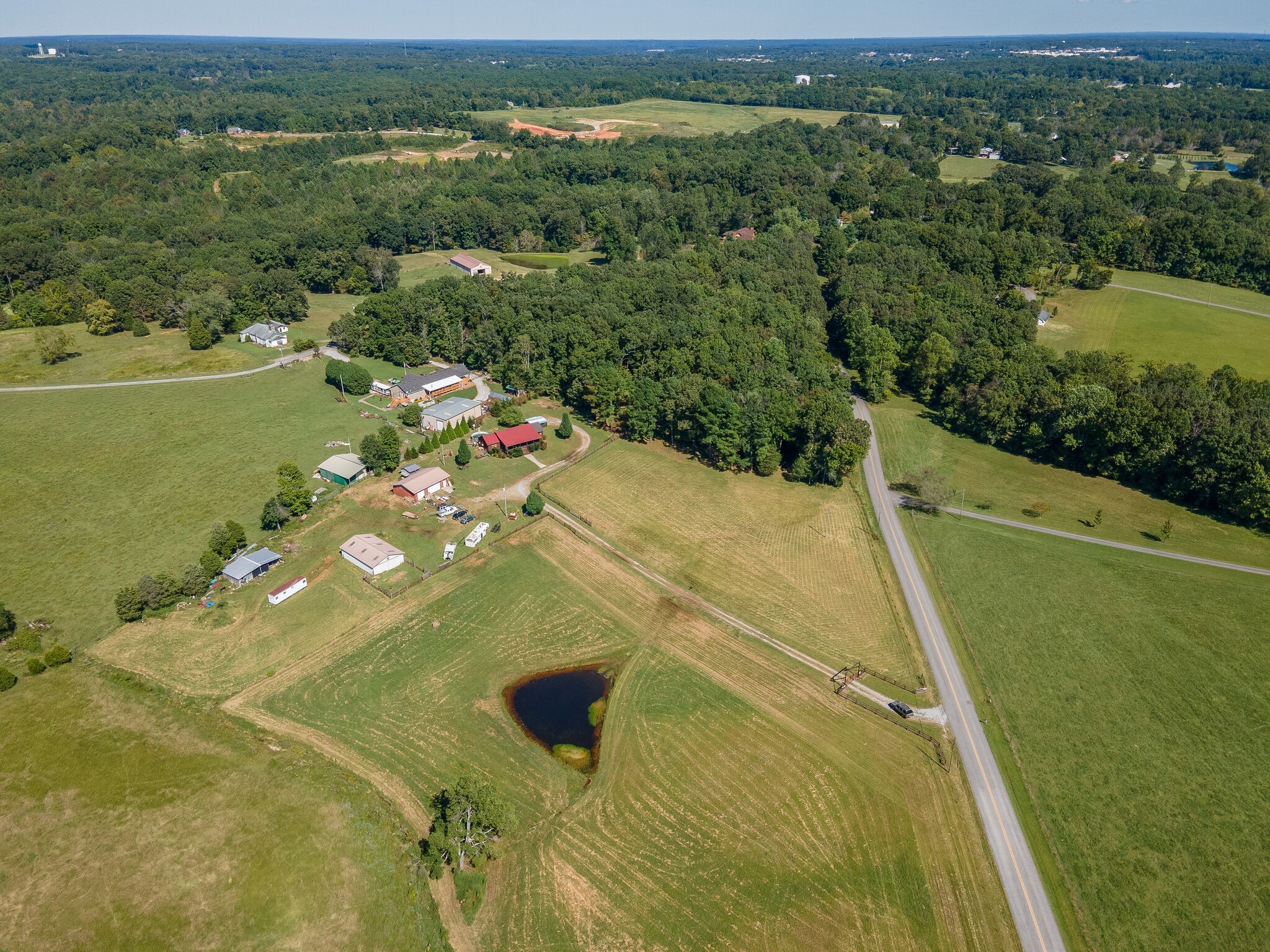 580 Eno Road Dickson, TN 37055 - Photo 28 of 48 a view of a swimming pool with a yard